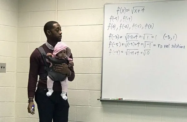 holding students baby