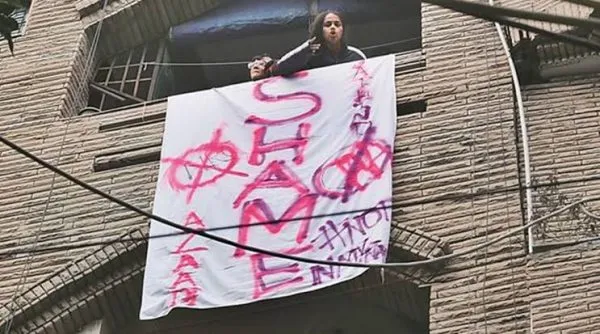women anti CAA banner