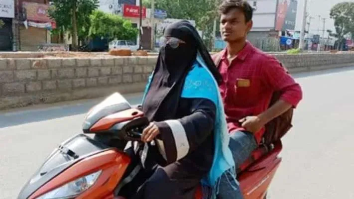 Telangana Mom rides scooter