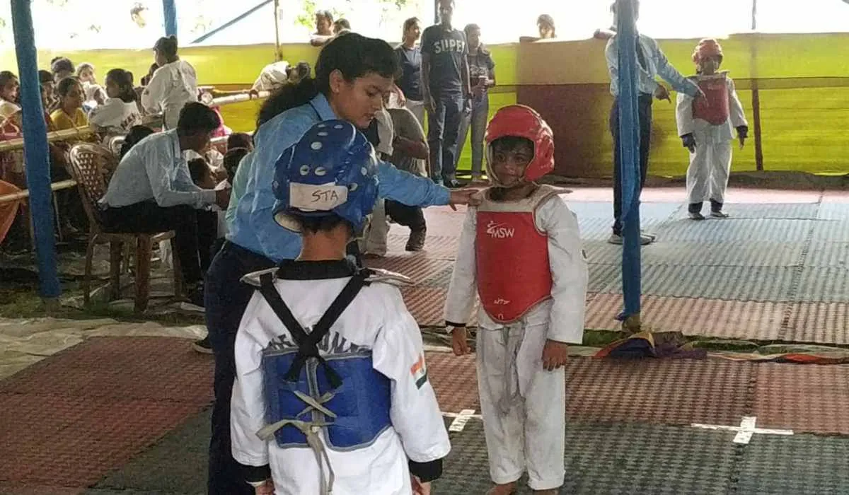 Learning Taekwondo, Simran Chowdhury is a Taekwondo teacher